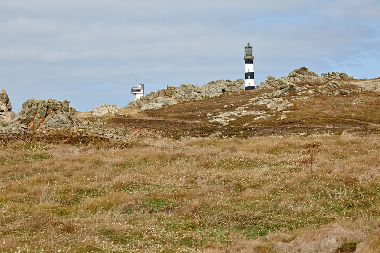 Standing on its promontory, the Créac'h lighthouse illuminates the night of Ouessant. Its light guides sailors and watches over storms, an immutable witness to the dialogue between sky and sea.